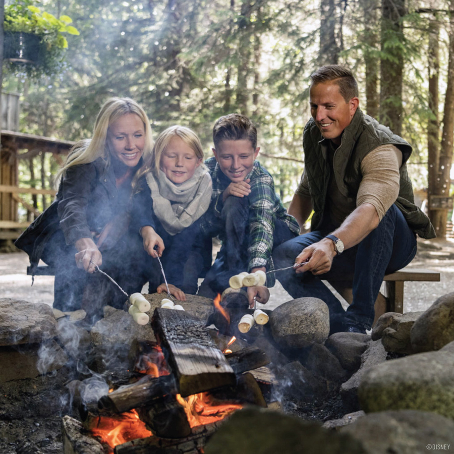 Family making S'mores on an Adventures by Disney Alaska trip